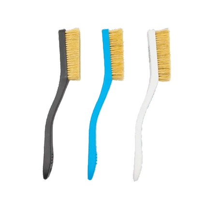 three plastic brushes with boar hair bristles used for rock climbing