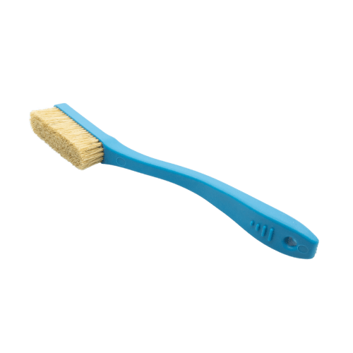 blue plastic brush used for rock climbing