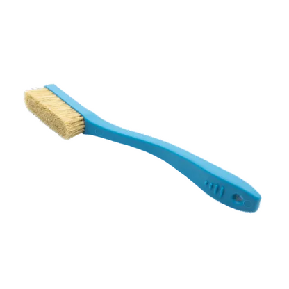 blue plastic brush used for rock climbing